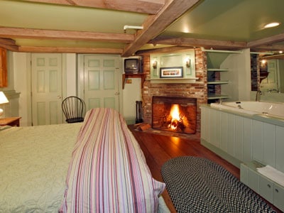 Romantic room with fireplace and two person whirlpool tub